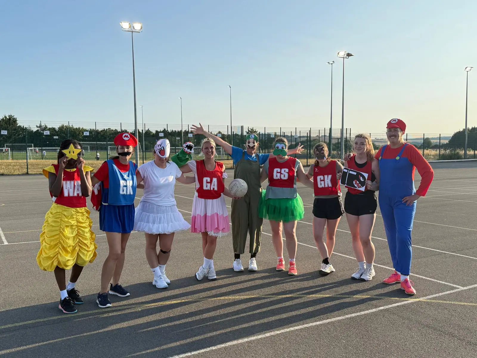Image of netball team holding their awards